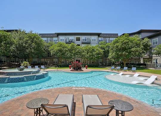Resort style pool with spa and landscaped courtyard at Highline Urban Lofts Apartments, Cypress, Texas