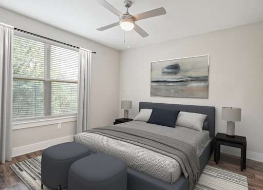 Bedroom with ceiling fan and upholstered bed frame at Highline Urban Lofts Apartments, Cypress