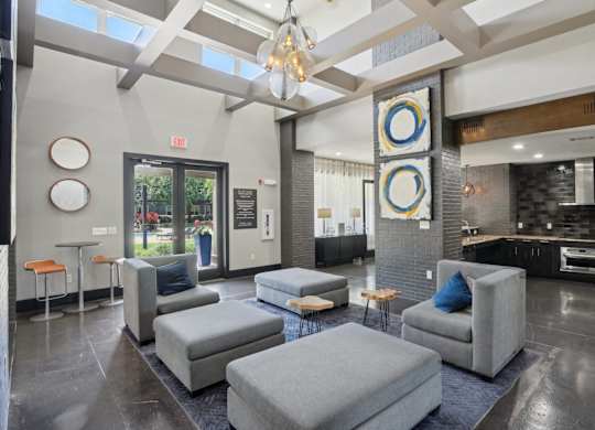 Clubhouse lounge with kitchen and skylights at Highline Urban Lofts Apartments, Cypress