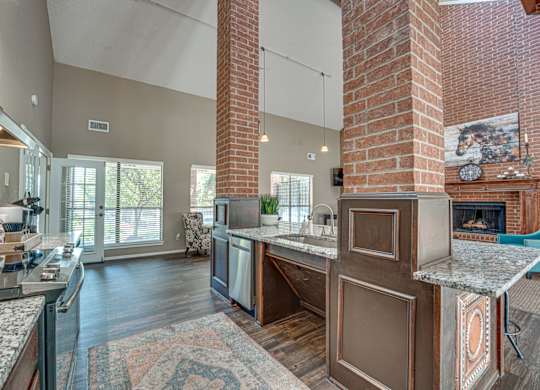 Kitchen with Brick Chimney at Bardin Oaks Apartments, Arlington, TX