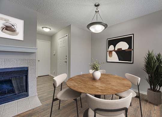 Light on top of wooden table and chairs at Timberglen Apartments, Dallas