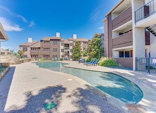 swimming pool in a residential area at Timberglen Apartments, Dallas, TX