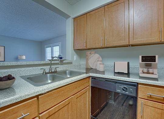 kitchen with granite countertop at Timberglen Apartments, Dallas