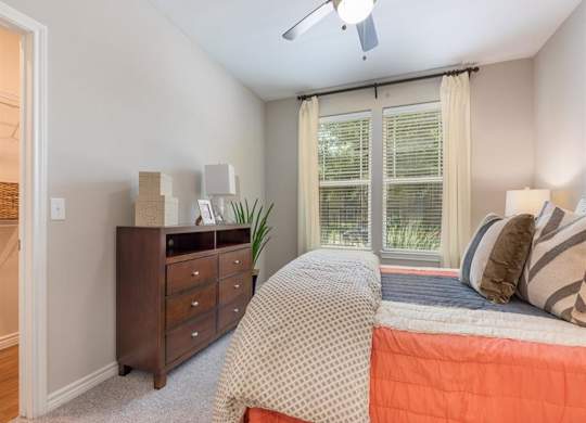 Bedroom With Ceiling Fan at Delray Apartments, Houston, Texas