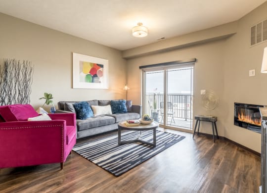 Living room with hardwood floors of one bedroom apartment for rent at 360 at Jordan West best new apartments West Des Moines IA 50266