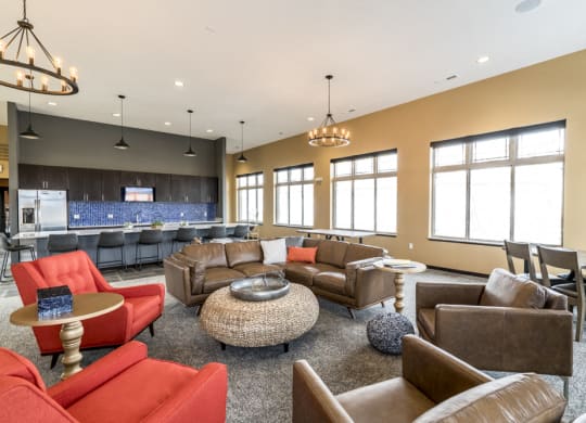 Clubhouse with seating and deluxe kitchen for entertaining at 360 at Jordan West best new apartments West Des Moines IA 50266