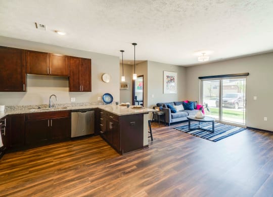 Spacious living room and kitchen of 2 bedroom apartment for rent at 360 at Jordan West best new apartments West Des Moines IA 50266