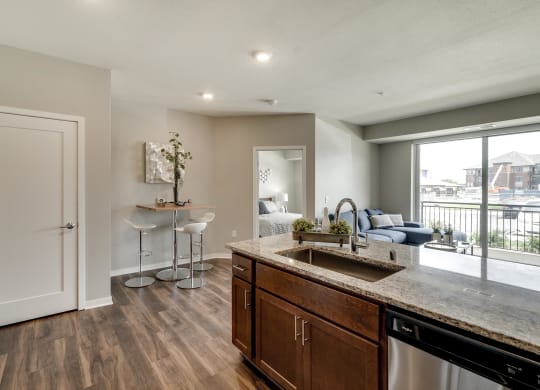 Cherry design scheme with darker cabinetry at Ascend at Woodbury new luxury apartments in Woodbury MN 55129