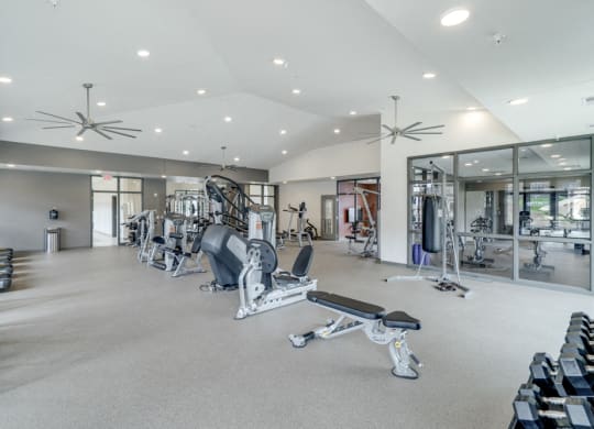 Large fitness center with free weights, weightlifting machines and cardio equipment at Ascend at Woodbury in MN