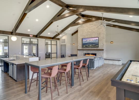 Clubhouse with seating, TV lounge and kitchen at Ascend at Woodbury MN 55129 new luxury apartments