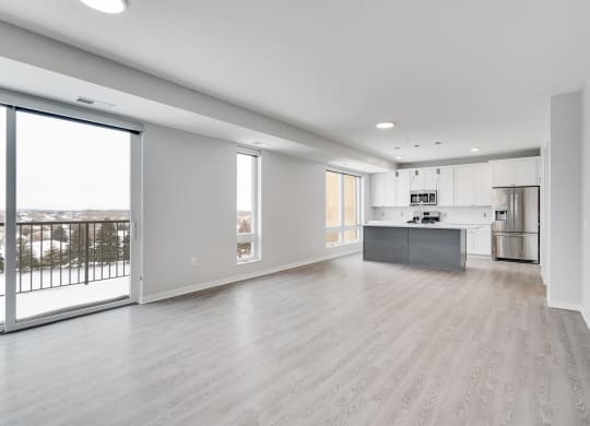 Open living and dining area with lots of natural light at Aspire at CityPlace in Woodbury, Minnesota