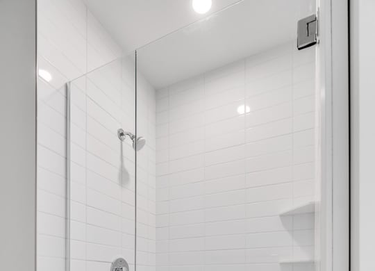Large shower with glass door at Aspire at CityPlace in Woodbury, Minnesota
