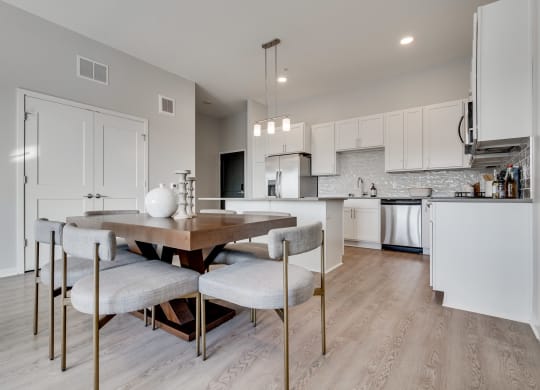 Furnished dining area off of the luxury kitchen in two bedroom apartment in Woodbury MN 55125