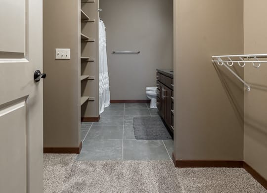 Interiors- Bathroom attached to expansive walk-in closet at the Villas of Omaha Butler Ridge in Omaha NE