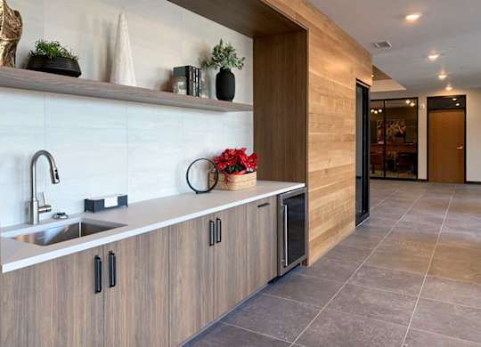 the front lounge featuring a small kitchenette area