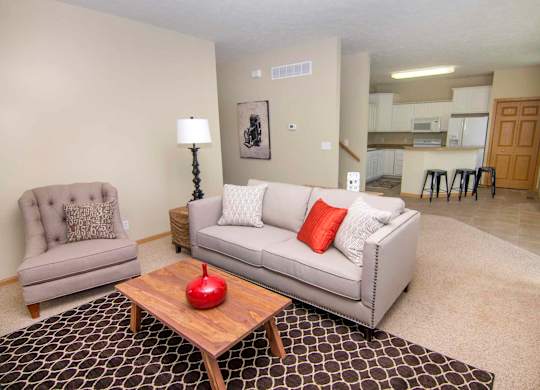 a living room with a couch and a table