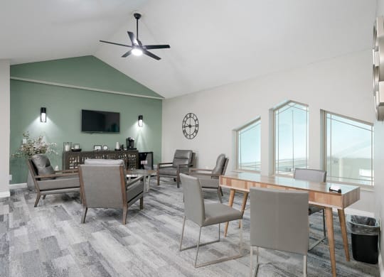 the front office with some chairs and a desk at Southwind Villas clubhouse