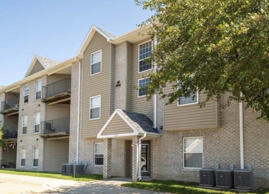 Buildings include controlled-access entries and balconies at Eagle Run Apartments in northwest Omaha 68164