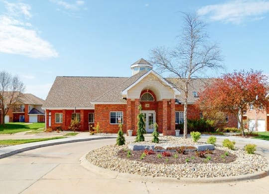 Brick exterior of the leasing office and community clubhouse at The Northbrook Apartments