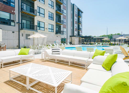 a poolside lounge seating area at the Haven at Uptown apartments