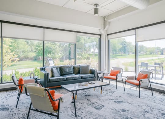 the preserve at ballantyne commons living room with furniture and large windows