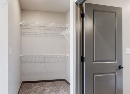Closet space providing storage in the Bliss floor plan at Haven at Uptown in Lincoln, NE