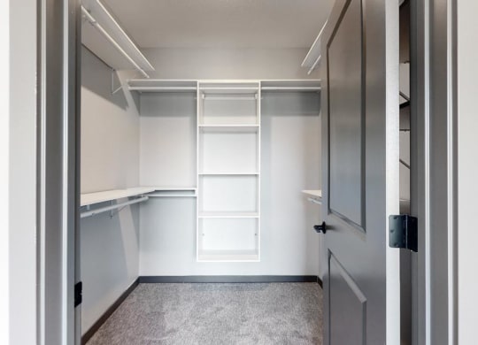 Large walk in closet that provides plenty of extra storage space for all of your belongings at Haven at Uptown in Lincoln, NE