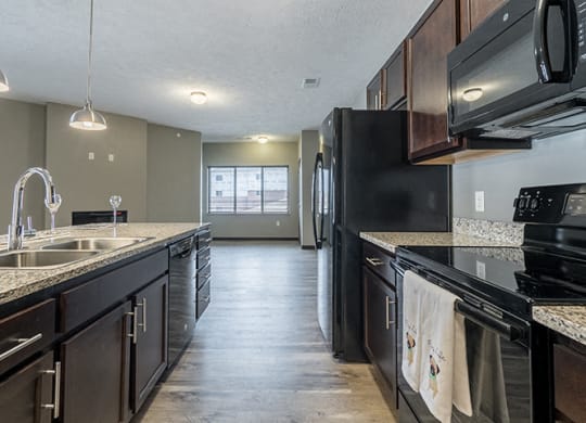 Large kitchen with lots of cabinets at North Pointe Villas