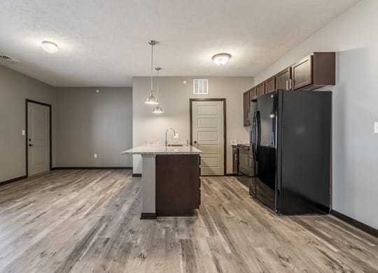 Kitchen with granite countertops and lots of cabinet space at North Pointe Villas