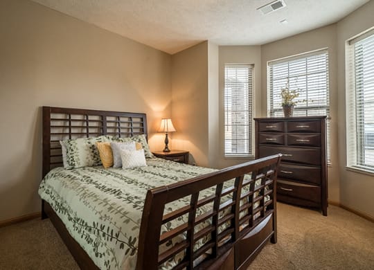 Interiors- Large bedroom with lots of natural light at Stone Creek Villas Apartments in Omaha Nebraska