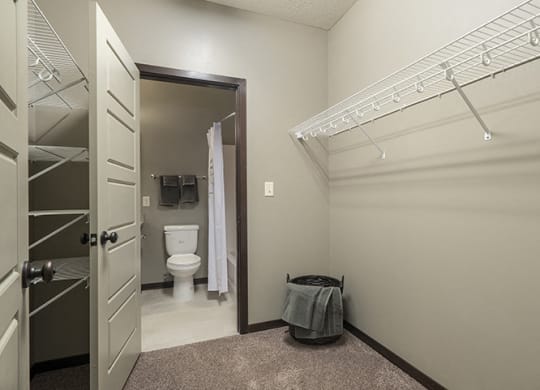 Large walk in closet providing plenty of storage space at North Pointe Villas