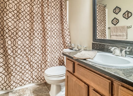 Renovated bathroom with a bathtub at Fountain Glen Apartments