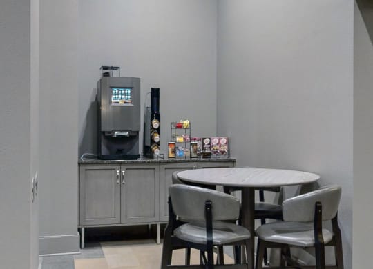 Grab a complimentary cup of coffee in the comfortable and modern lobby at Midtown Crossing Apartments