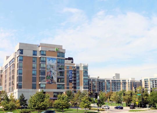 a view of a city with buildings and trees