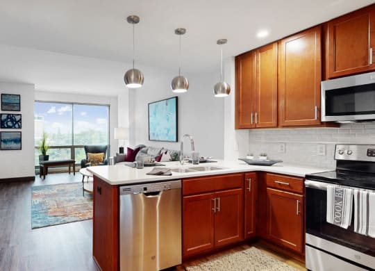 Midtown Crossing Apartments has floor-to-ceiling windows that fill this 1 bedroom apartment with bright natural light.