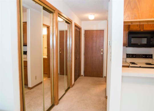 hallway including spacious closets at Capitol View Apartments in Lincoln Nebraska
