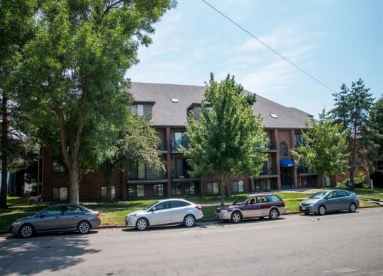 trees and landscaping around property at Packard House Apartments in Lincoln Nebraska
