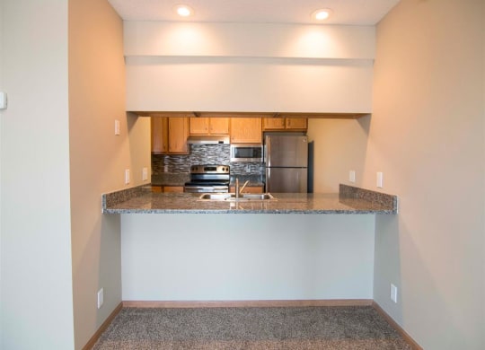 Interiors-Skyline View Apartments Updated Kitchen and Breakfast Bar in Lincoln NE