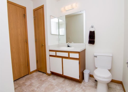 Spacious bathroom with linen closet storage at Northbrook Apartments in Lincoln NE