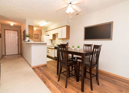 Renovated apartment with dining area at Eagle Run Apartments in Omaha, NE