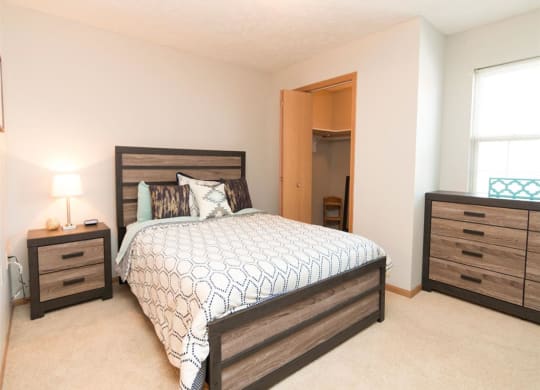 Bedroom with walk-in closet at Eagle Run Apartments in Omaha, NE