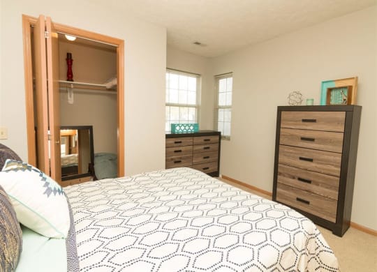 Bedroom with storage space at Eagle Run Apartments in Omaha, NE