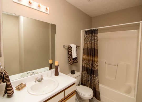 Bathroom with tub at Eagle Run Apartments in Omaha, NE