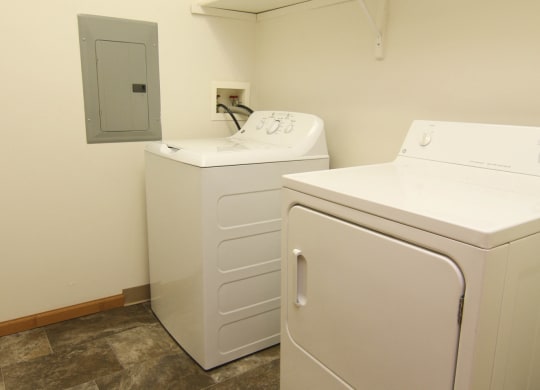Full size washer and dryer and laundry room included at Northbrook Apartments