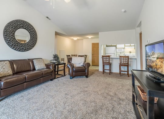 a living room with a couch and a tv