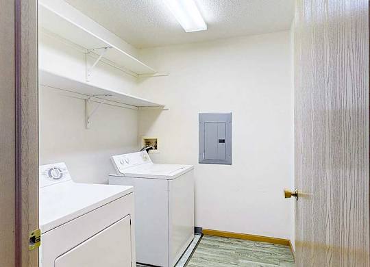 laundry room with a washer and dryer.