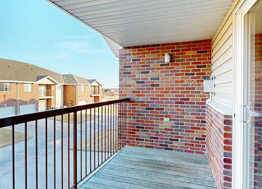 a balcony with room for seating