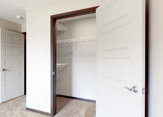 Bedroom with large walk in closet for storage in Northridge Heights apartments in Lincoln