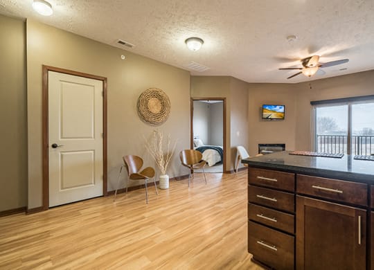 Interiors- Open-concept living in an apartment at the Villas of Omaha Butler Ridge in Omaha NE