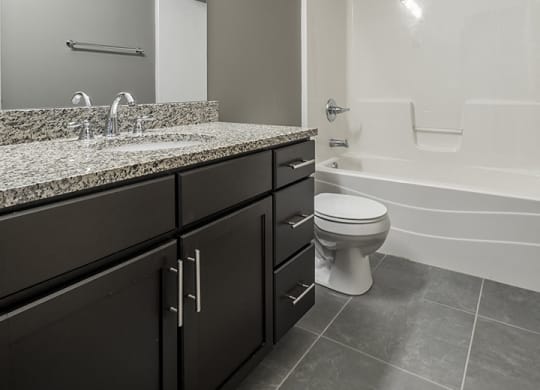Interiors- Granite countertops and stand-up shower in Bathroom at the Villas of Omaha at Butler Ridge in Omaha Nebraska